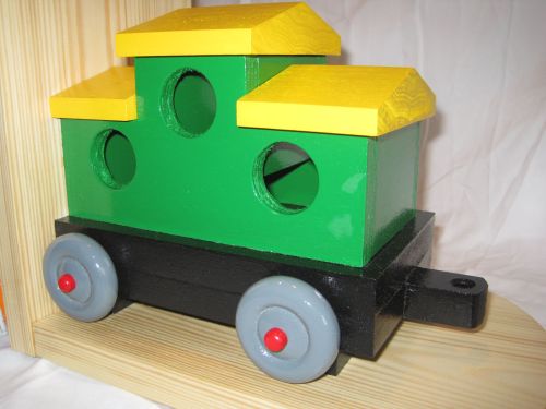Handmade wooden childs bookcase stand in the form of a train